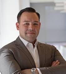 John Herrera — Ted Moudis Associates