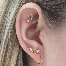 Another Great Curatedear On A Celestial Theme The Diamond Moon Stud With Its Guiding Star An Invisible Ear Jewelry Initial Earrings Diamond Earrings Studs