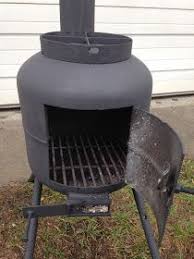 I Made This Small Wood Stove From A 20lb Propane Tank I Added A Cross Brace On The Top To Place A Pan For Gas Bottle Wood Burner Wood Heater