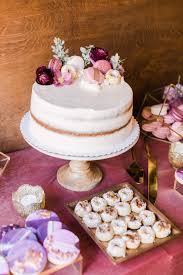 The cake was displayed on a crystal stand provided by the bride and groom and had some sparkly crystals scattered around. 24 Ways To Serve French Macarons At Your Wedding Martha Stewart