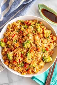 This Vegetarian Quinoa Fried Rice Is Quick And Easy To Make And Loaded With Fluffy Quinoa And Tender V Quinoa Recipes Easy Quinoa Fried Rice Vegetarian Recipes