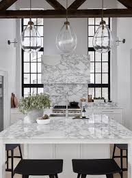 Our modern & contemporary designers kitchen bar stools are available as next day delivery. A Square Kitchen Island Includes Casual Seating In This Toronto Home