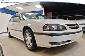 Image result for Medium Green 2002 Impala