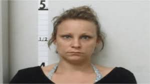 A Thayer woman was arrested Saturday