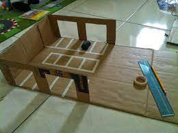 大大小小的車都東一台西一台 需要停車場收納一下 wooden toy garage diy kids toys paper crafts diy kids