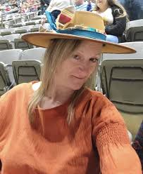 Destiny Infield has the most beautiful work!! I love sunflowers and these  went perfectly with my work attire!