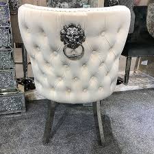 The grey luxury quilted velvet chrome leg lion knockerback dining chair these dining chairs are sure to make a bold statement with its stunning lion knockerback design and chrome polished steel legs. Diana Wide Mink Velvet And Chrome Dining Chair With Lion Ring Knocker Picture Perfect Home
