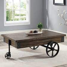 Distressed wagon coffee table rustic brown magnussen furniture vernon distressed coffee table Otis Wagon Wheel Coffee Table With Drawer By Crown Mark 4238 01 Wholesale Furniture Mattress