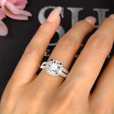 This Is Complimented Perfectly With The Split Diamond Set Shoulders Allowing Th Halo Style Engagement Rings Engagement Ring White Gold Unique Engagement Rings