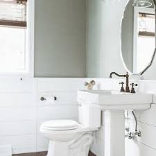 They offer wonderful examples of how to use half walls to maximize space while at the same time creating separate function areas so the bathroom can be used by more than one person at a time. Horizontal Wood Paneled Half Wall Design Ideas