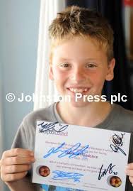 25015298-Pictures Martin Bostock Schoolchildren from Blackpool schools at a  special party at Blackpool football club to celebrate their 100%  attendance. St Nicholsas school.