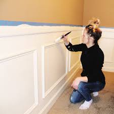 Ask a helper to hold a length of chair rail against the wall if there is not an obvious top or bottom to the rail. How To Install Wainscoting
