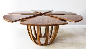 Maybe an expanding dining table that rotates to expand and serve more people. Johnson Furniture