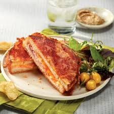 Take half of the broken up peices of cheese and place them on top of the bread, trying to cover all the available places on the bread. Christy S Awesome Hot Ham And Cheese Recipe Allrecipes