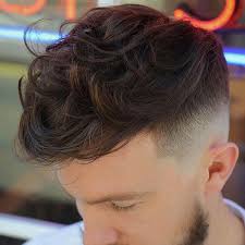 Textured quiff with short fade length: Picture Of A Textured Wavy Quiff And A Fade Is One Of The Hottest Haircuts To Rock Right Now
