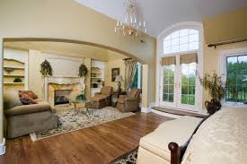 Master bedroom suite with sitting area. Master Suite Features Arched Opening From Bedroom To Sitting Room Traditional Bedroom Chicago By Orren Pickell Building Group Houzz