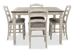 Realyn Five Piece Counter Height Dining Room Table And Stools Set Mathis Brothers Furn In 2020 Counter Height Dining Room Tables Dining Room Table Farmhouse Interior