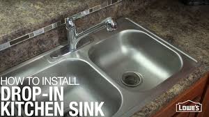 The lt is simply referring to the size of a particular fitting. How To Install A Drop In Kitchen Sink Lowe S