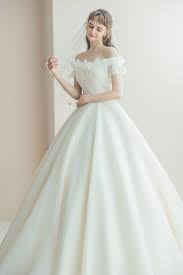 Wedding gowns with low back are perfect for a spring or summer wedding. Less Is More 15 Simple Yet Beautiful Wedding Dresses For Modern Brides Praise Wedding