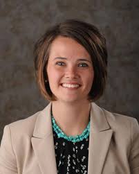 Pittman touts business background