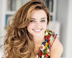 What will a girl think if I look at her and smile casually?