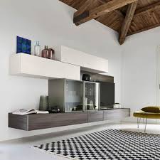Die Exklusive Design Wohnwand C35 Bringt Mit Ihrer Glasvitrine Und Einer Led Beleuchtung Eine Elegante Note Ins W Wall Unit Designs Wall Unit Modern Wall Units