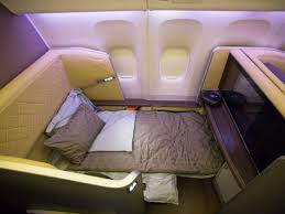 There are 4 flat bed seats in first class, 35 flat bed seats in business, and 303 standard economy class seats. Singapore Airlines Upgrades 777 Interiors