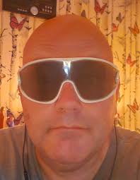 Son's man bun and glasses