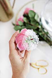 This creates the illusion of flowers being poured out of the teacup into the saucer. Easy Floating Floral Arrangement Diy A Beautiful Mess
