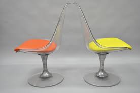Mid century modern lucite chair by charles hollis jones. Four Lucite Chromcraft Tulip Swivel Dining Chairs Mid Century Modern Colorful At 1stdibs