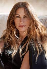 She is a woman of the year because: Natural Wonder Julia Roberts