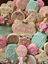 Use baby shower themed cardboard cutouts to cut the dough into the required shape (onesie, ducks, bottles, etc.) or you can retain the disc shape to make blue cookies. Baby Shower Cookies That Are Too Cute To Eat Tulamama