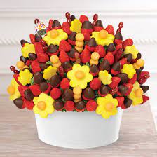 Rather than drivers arriving at homes and businesses with flowers, the company produces bouquets of fresh cut, premium fruit. Berry Chocolate Bouquet Edible Arrangements
