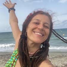 A giant girl waters a tree in this awesome wall mural in Poland by Natalia  Rak. Via