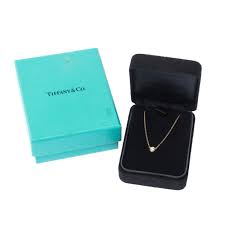 Choose from a variety of materials and add one to your look to go from simple to elegant. Tiffany Co Diamond By The Yard 18k Yellow Gold Pendant Necklace Tiffany Co Tlc