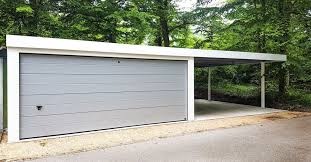 Wieviel Platz Darf Es Denn Sein Doppelgarage Mit Sektionaltor Und Anbaucarport Da Passen Schon Drei Schick Eingang Uberdachung Carport Eingangsuberdachung