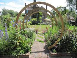 Outdoor Creating Peaceful Garden With Incredible Pergola Design Ideas Round Pergola For Striking Garden Des Garden Design Curved Pergola Building A Pergola