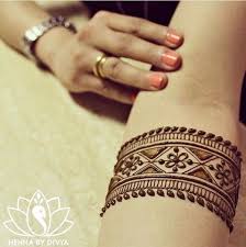 Henna gives a cooling effect. Henna Tattoo Arm Bands Wrist Henna Henna Tattoo Designs Simple Henna Tattoo