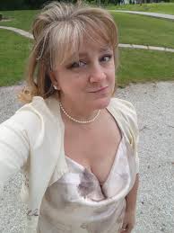 What are some tips for taking natural-looking photos of yourself?