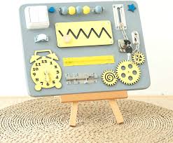 Cut a board of plywood or wood and paint it or decorate the way you like. Customized Baby Sensory Toys Wooden Montessori Educational Learning Toys Toddler Activity Board Busy Board Toys For Toddlers Ages 1 4 China Wooden Toys And Busy Board Price Made In China Com