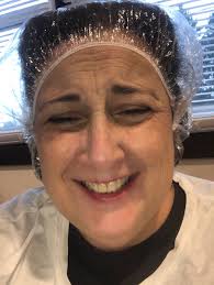 A downpour just minutes after my hair was done. I was going to make a run  for it even in my aircast boot—dumb idea—when my hair stylist gave me a  plastic bonnet