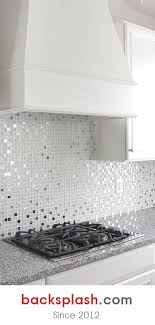 Tropical kitchen wallpaper ideas in white kitchen. Modern White Glass Metal Kitchen Backsplash Tile Backsplash Com In 2021 Metal Backsplash Kitchen White Tile Kitchen Backsplash Casita Ideas