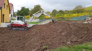 Prix terrassement par m² terrain en pente. Creation De Terrasses Sur Un Terrain En Pente Derriere Une Maison Terrassement Demolition Enrochement Pave Enrobe Bas Rhin 67 Alsace Boehler Sebastien Sarl