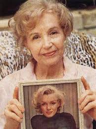 Writer Berniece Baker Miracle holding a photograph of her half-sister  Marilyn Monroe in 1994. She'll be 102 years-old this July unfortunately but  this July..
