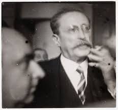Leon Blum smoking a cigarette, Paris]