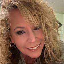 What local company is recommended for lawn care in Clinton, TN?