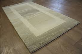 This includes determining factors like material, carpet pile, durability, color and size, as well as helping with any custom carpet design. Wissenbach Original Handgeknupfter Nepal Tibet Teppich 70x140cm 100 Wolle Beige Grau