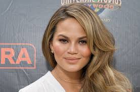 Chrissy Teigen Puts Something Weird In Her Guac Self
