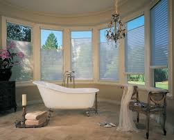 Add a patterned fabric to the window panes. Room Focus Bathroom Window Treatments