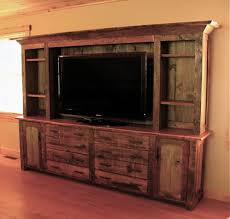 Rustic Entertainment Center I Need To Make This Using The Wood From The Barn At My Gr Rustic Entertainment Center Wood Entertainment Center Barnwood Furniture